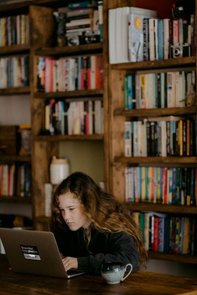 Young teenager attending life coaching sessions in an library.